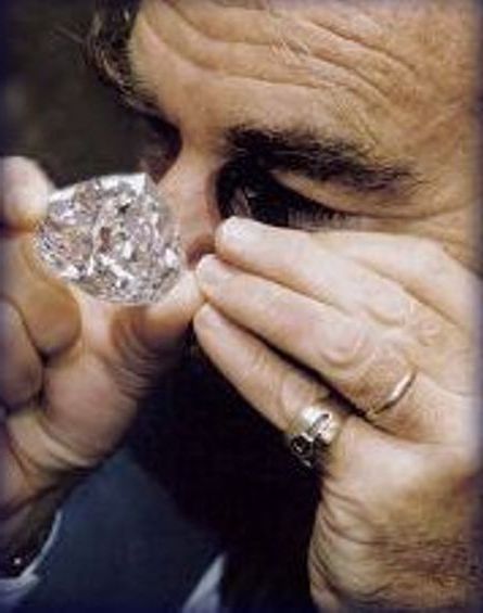 Gabi Tolkowsky Examining the Centenary Diamond with a Jeweler's Loop